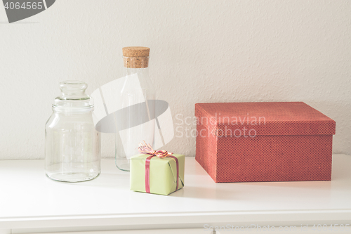 Image of Gift boxes and glass bottles