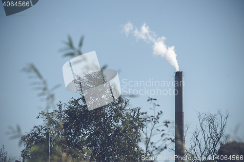 Image of Factory chimney with white smoke