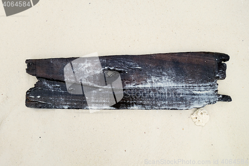 Image of old wood board on a beach