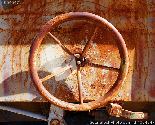 Image of old rusty valve on a train