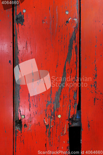 Image of Old wood board painted red