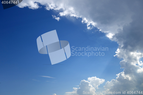 Image of Blue sky with rain clouds