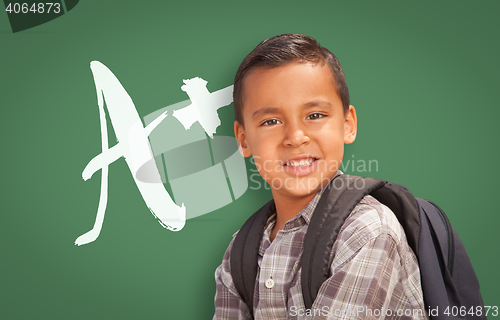 Image of Hispanic Boy Up in Front of A+ Written on Chalk Board