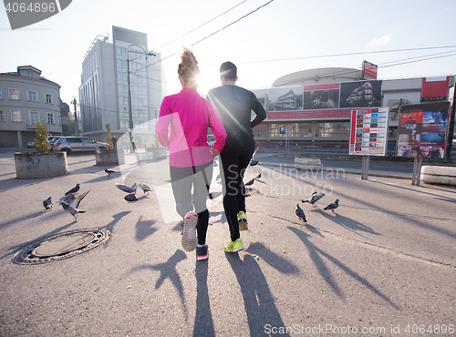 Image of young  couple jogging