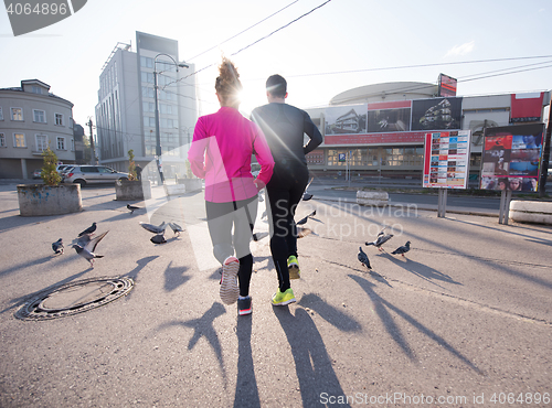 Image of young  couple jogging