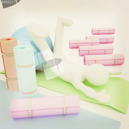 Image of 3d man on a karemat with fitness ball. 3D illustration. 3D illus