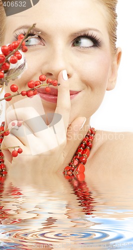 Image of red ashberry girl in water