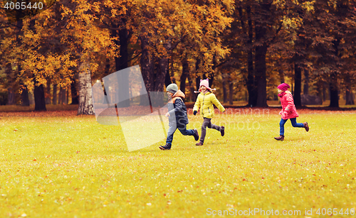 Image of group of happy little kids running outdoors