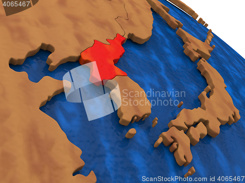 Image of North Korea on wooden globe