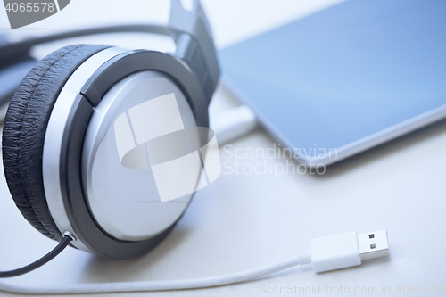 Image of Headphones digital tablet and USB cable