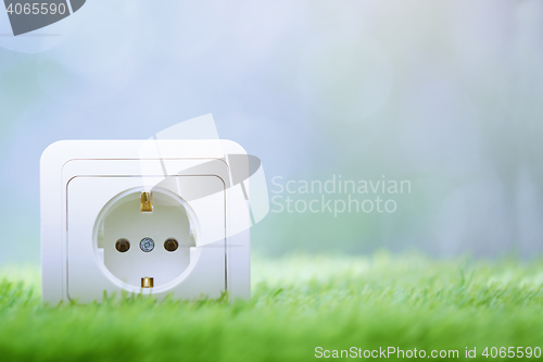 Image of Electric outlet in the grass