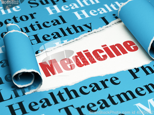 Image of Health concept: red text Medicine under the piece of  torn paper