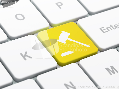 Image of Law concept: Gavel on computer keyboard background