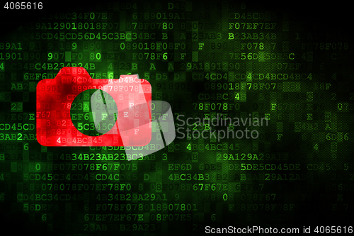 Image of Travel concept: Photo Camera on digital background