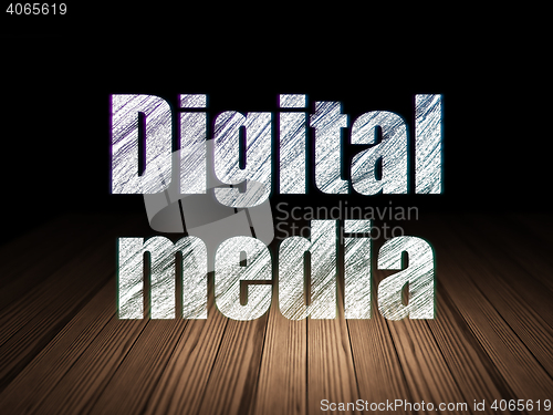 Image of Marketing concept: Digital Media in grunge dark room