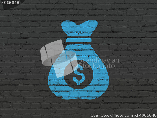 Image of Finance concept: Money Bag on wall background