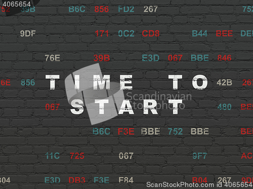 Image of Time concept: Time to Start on wall background