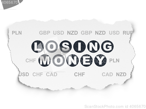 Image of Banking concept: Losing Money on Torn Paper background