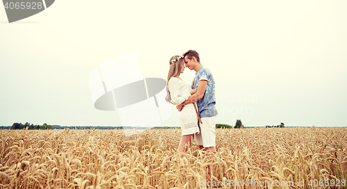 Image of happy smiling young hippie couple outdoors