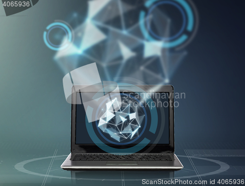 Image of laptop with low poly shape projection 