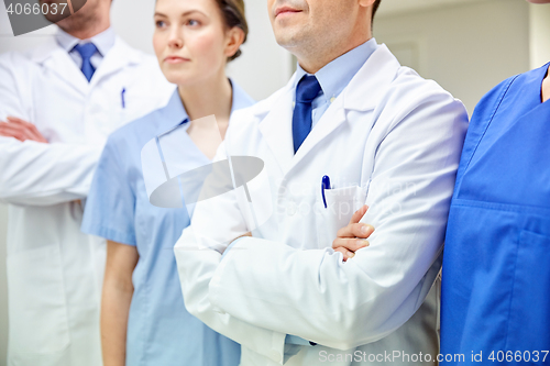 Image of close up of medics or doctors at hospital corridor