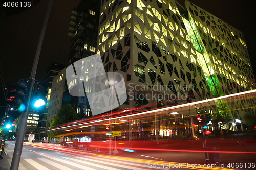 Image of moving car with blur light through Dronning Eufemias gate street