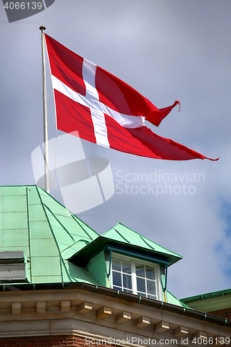 Image of Waving Danish flag on the mast in Copenhagen, Denmark