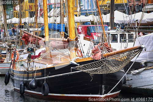 Image of COPENHAGEN, DENMARK - AUGUST 15, 2016: Boats in the docks Nyhavn