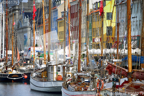 Image of COPENHAGEN, DENMARK - AUGUST 15, 2016: Boats in the docks Nyhavn