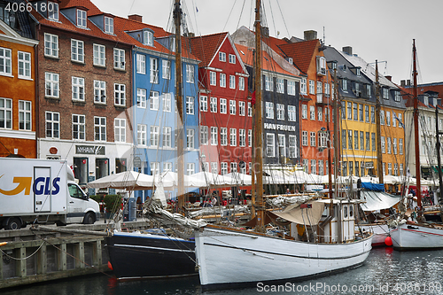 Image of COPENHAGEN, DENMARK - AUGUST 15, 2016: Boats in the docks Nyhavn