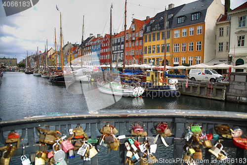 Image of COPENHAGEN, DENMARK - AUGUST 15, 2016: Boats in the docks Nyhavn