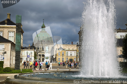 Image of COPENHAGEN, DENMARK - AUGUST 15, 2016: A fountain in the Amalie 