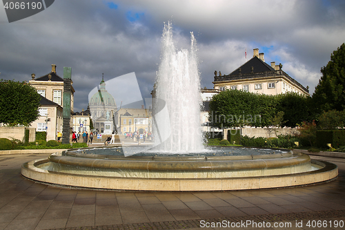 Image of COPENHAGEN, DENMARK - AUGUST 15, 2016: A fountain in the Amalie 