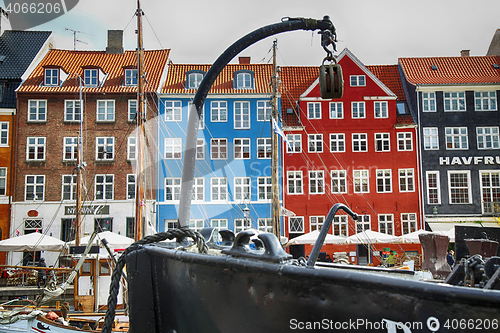 Image of COPENHAGEN, DENMARK - AUGUST 15, 2016: Boats in the docks Nyhavn