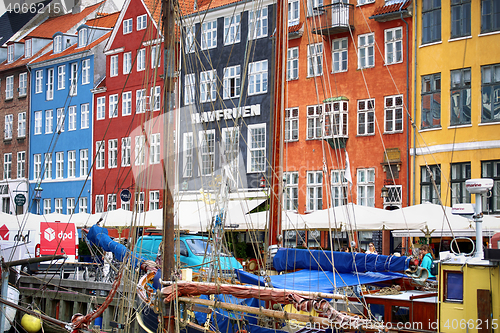 Image of COPENHAGEN, DENMARK - AUGUST 15, 2016: Boats in the docks Nyhavn