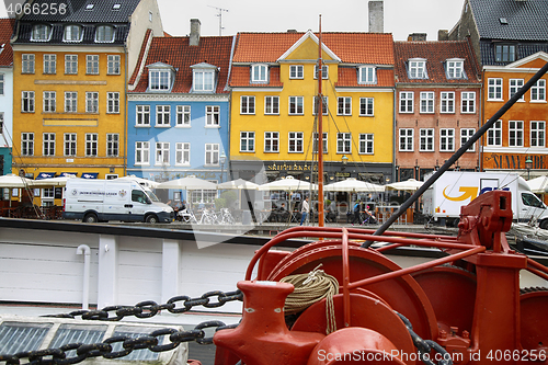 Image of COPENHAGEN, DENMARK - AUGUST 15, 2016: Boats in the docks Nyhavn