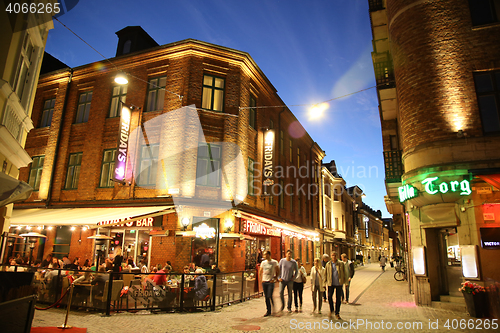 Image of MALMO, SWEDEN - AUGUST 16, 2016: People walk on crossroad of the