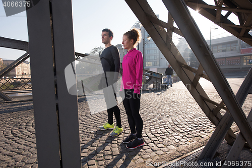 Image of young  couple jogging