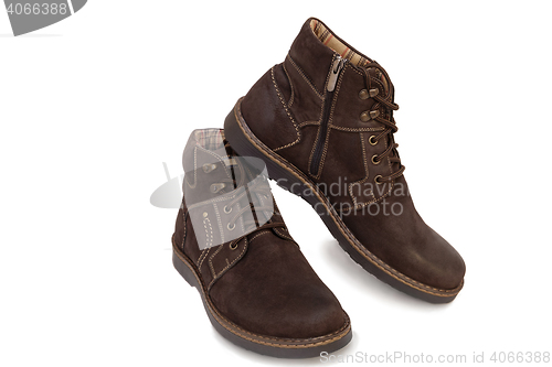Image of Mens shoes for winter on a white background.
