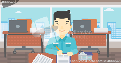 Image of Real estate agent signing contract.