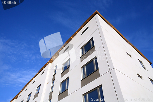 Image of  shot of a facade of a new building at blue sky