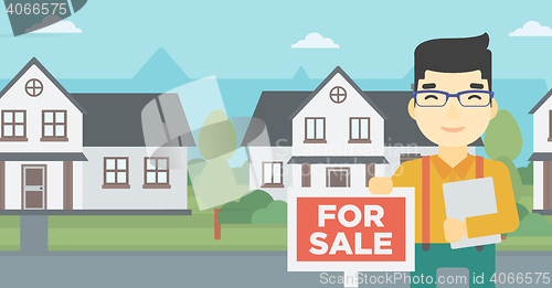 Image of Real estate agent offering house.