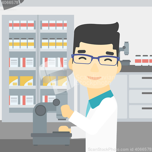 Image of Laboratory assistant with microscope.
