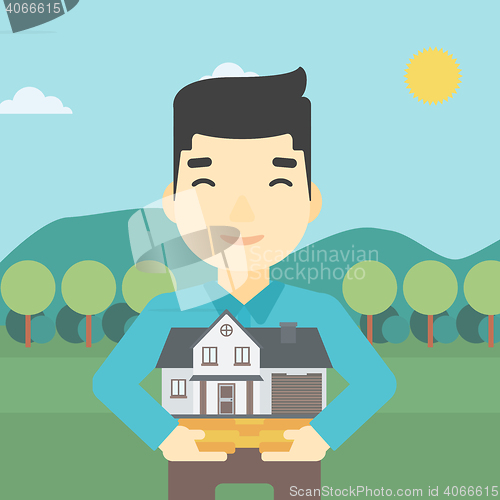 Image of Man holding house model vector illustration.