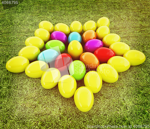 Image of Colored Easter eggs as a flower on a green grass. 3D illustratio