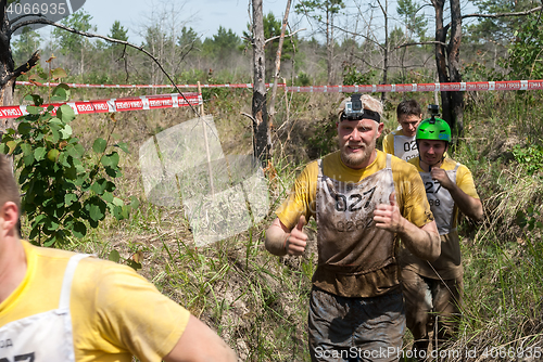 Image of Team runs between stages in extrim race.Tyumen