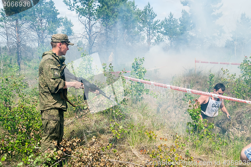 Image of Soldier shoots by blank cartridges for shock