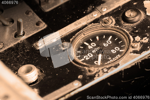 Image of Different meters and displays in an old plane