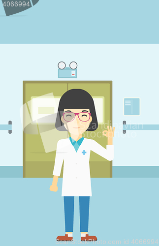 Image of Doctor showing ok sign vector illustration.