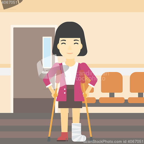 Image of Woman with broken leg and crutches.